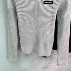 Ribbed High-Neck Wool Sweater